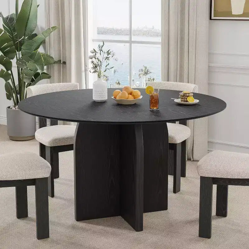 Tavolo da pranzo rotondo in legno massello da 52" x 52" con finitura nera e gambe ad arco