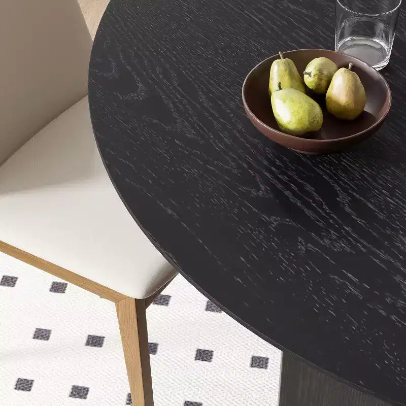 Tavolo da pranzo rotondo in legno massello da 52" x 52" con finitura nera e gambe ad arco